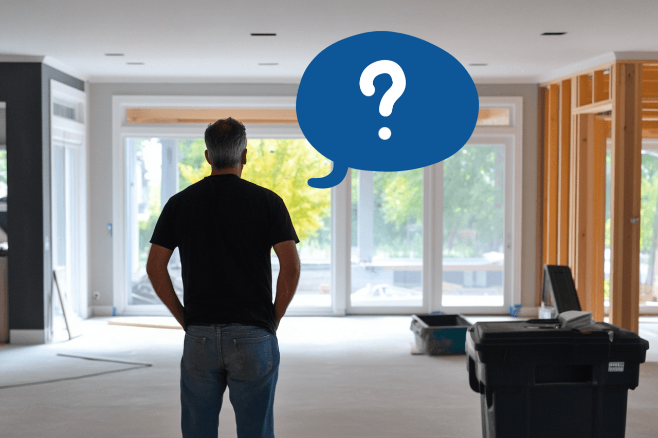 Man observing the interior of a house under renovation with ongoing construction work and an illustrated question bubble.