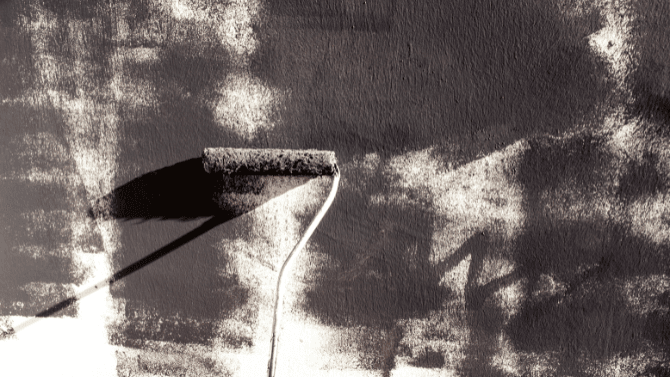 Application of a black paint on wall&nbsp;