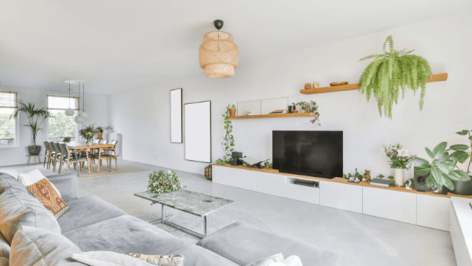 Clean white living room with storage