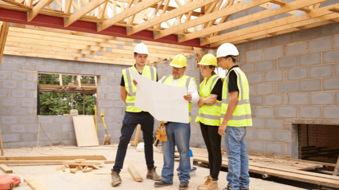 3 apprenticeships with one contractor inside of a house in construction