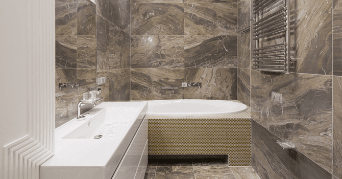 Fully tiled small bathroom